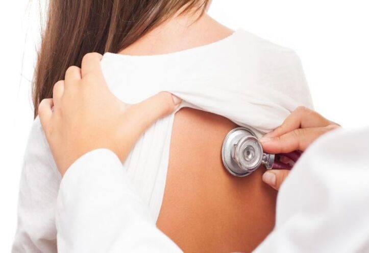 doctor's examination for pain in the shoulder blade